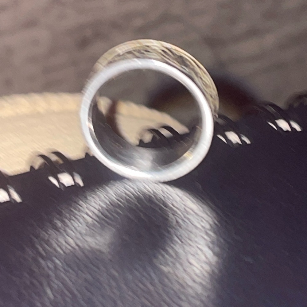 Stainless steel men’s wedding band. Size 10 1/2. No scratches. Great condition